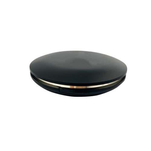Round Concealer Palette – a black round compact opens to show a mirror and a divided gold-tone interior