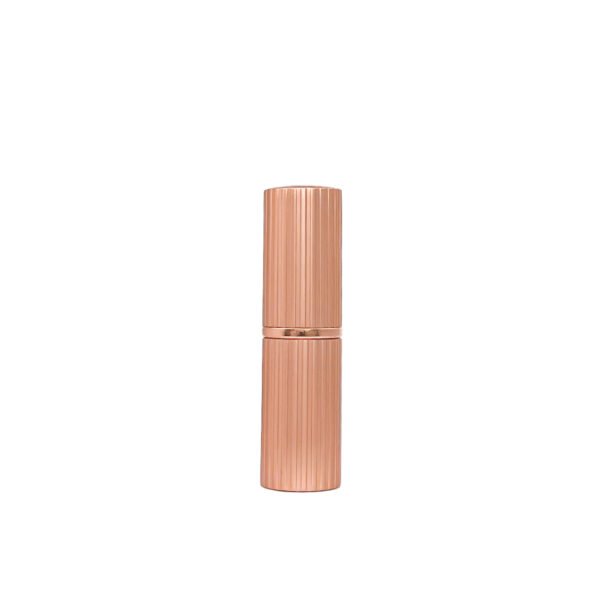 st-ls-001-04 Rose gold ribbed lipstick tube with cap closed