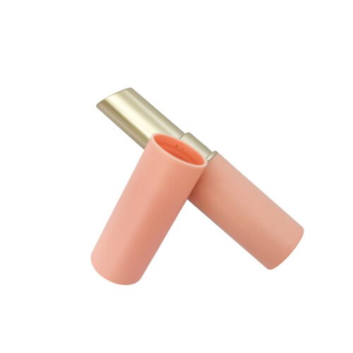 Peach Lipstick Tube – a smooth peach-colored shell surrounds a gold-tone lipstick mechanism