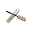 st-mc-001-03 Cross placed houndstooth empty mascara packaging, applicator stem taken out