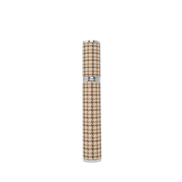 st-mc-001-05 Closed houndstooth empty mascara tube, full vertical shot