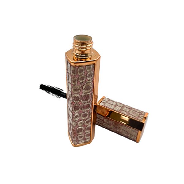 Patterned Square Mascara Tube – this straight-sided mascara case has a square-looking cross-section, warm gold-tone borders and patterned face panels