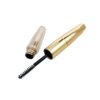 st-mc-004-03 1. Close-up shot of empty mascara packaging, separated gold cap and ribbed clear bottle with nylon brush applicator