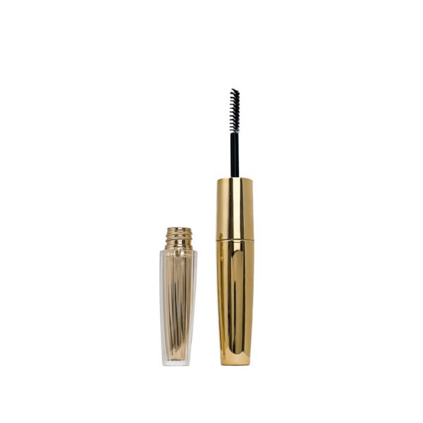 st-mc-004-05 1. Front view of disassembled empty mascara tube, ribbed clear bottle and gold cap with extended nylon brush