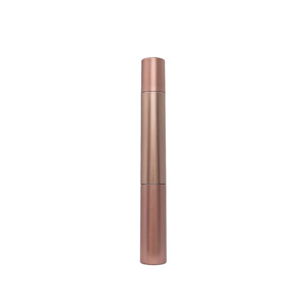 Dual End Mascara Tube – the photographs show a long straight tube with brush assemblies accessible at both ends