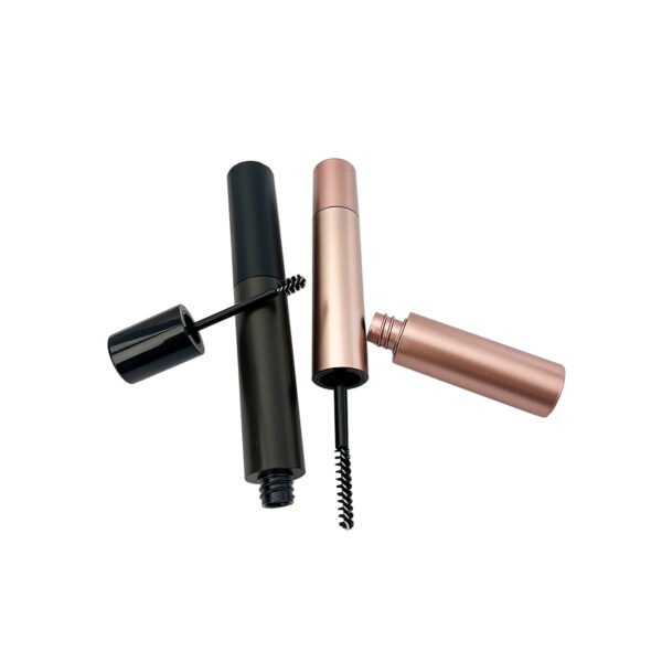 Group display of rose gold and black matte cylindrical empty mascara tubes with spiral nylon brush applicator