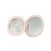 Top view of fully opened glossy gradient pink oval powder compact, showing built-in mirror and circular aluminum metal powder tray`