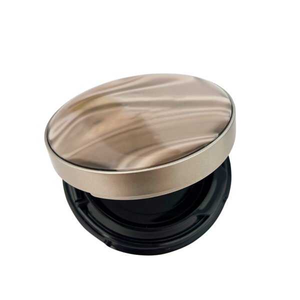 Tilted view of partially opened round marble pattern powder compact
