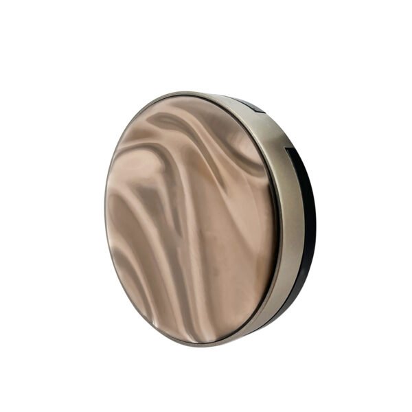 Side view of closed round powder compact with marble pattern top